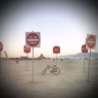 Bike on Playa inside Traffic Signs